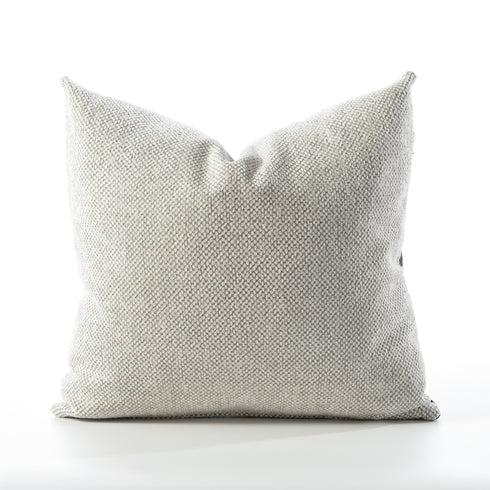 A square throw pillow in a textured, woven light gray fabric, photographed against a seamless white background.